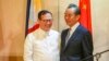 Philippine Foreign Affairs Secretary Teodoro Locsin Jr., left, and visiting Chinese Foreign Minister Wang Yi are seen after their joint news conference in Davao city, in southern Philippines, Oct. 29, 2018.