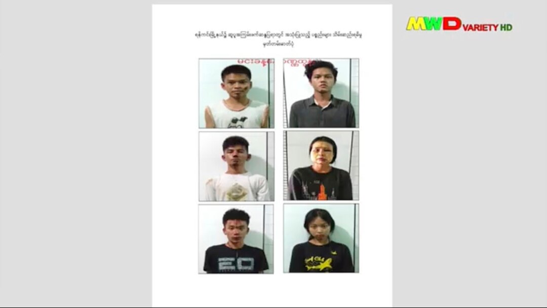 This image from an April 18, 2021 news report by Myawaddy TV shows people who security forces said they detained in a weapons raid a day earlier in Yangon, Myanmar. (Myawaddy TV via AP)