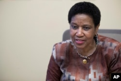 FILE - Phumzile Mlambo-Ngcuka, United Nations Under-Secretary-General and Executive Director of U.N. Women, speaks during an interview with The Associated Press in New York, March 7, 2018.