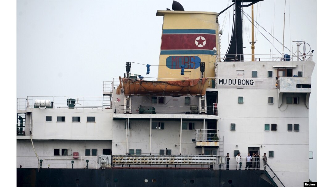 Crew members are seen on the 6,700-tonne freighter Mu Du Bong in the port of Tuxpan, April 9, 2015.