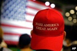 FILE - Supporters of Republican presidential candidate Donald Trump wait for the start of a rally in Westfield, Ind., July 12, 2016.