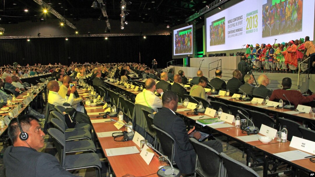 Delegates of the World Anti-Doping Agency (WADA) watch the Soweto Gospel Choir perform during the World Conference on Doping in Sport in Johannesburg, South Africa, Nov. 15, 2013.