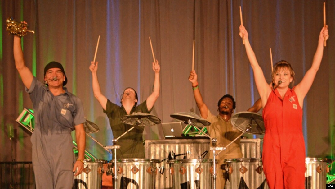 The six members of Vocal Trash spread their reuse and recycle message with every performance. (VOA/S. Logue)