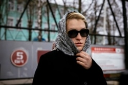 Alliance of Doctors union's leader Anastasia Vasilyeva stands next to the gate of the IK-3 penal colony where jailed Kremlin critic Alexei Navalny was reportedly transferred in the city of Vladimir on April 20, 2021.