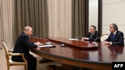 Зустріч очільника МАГАТЕ Гроссі з президентом РФ Путіним та очільником "Росатома" Ліхачовим. Фото: Ramil Sitdikov/AFP