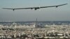 Solar Impulse flying over Paris in 2011. (© Solar Impulse | Jean Revillard )