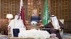 Sheikh Tamim bin Hamad Al-Thani, Amir of Qatar (l) meets with Saudi King Salman at the Riyadh airport in Saudi Arabia, Feb. 17, 2015.
