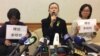 李明哲妻子李净瑜3月31日在记者会上（美国之音记者申华 拍摄）