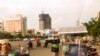 Vietnamese merchants in Ho Chi Minh City are waiting for business, and for the economy, to pick up, Jul. 18, 2013. (VOA - L. Hoang)