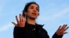 FILE - Nobel Peace Prize laureate, Yazidi activist Nadia Murad, gestures while talking to the people during her visit to Sinjar, Iraq, Dec. 14, 2018.