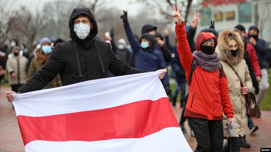 Belarusian opposition supporters attend a rally to reject the presidential election results in Minsk, Belarus, Nov. 22, 2020. 