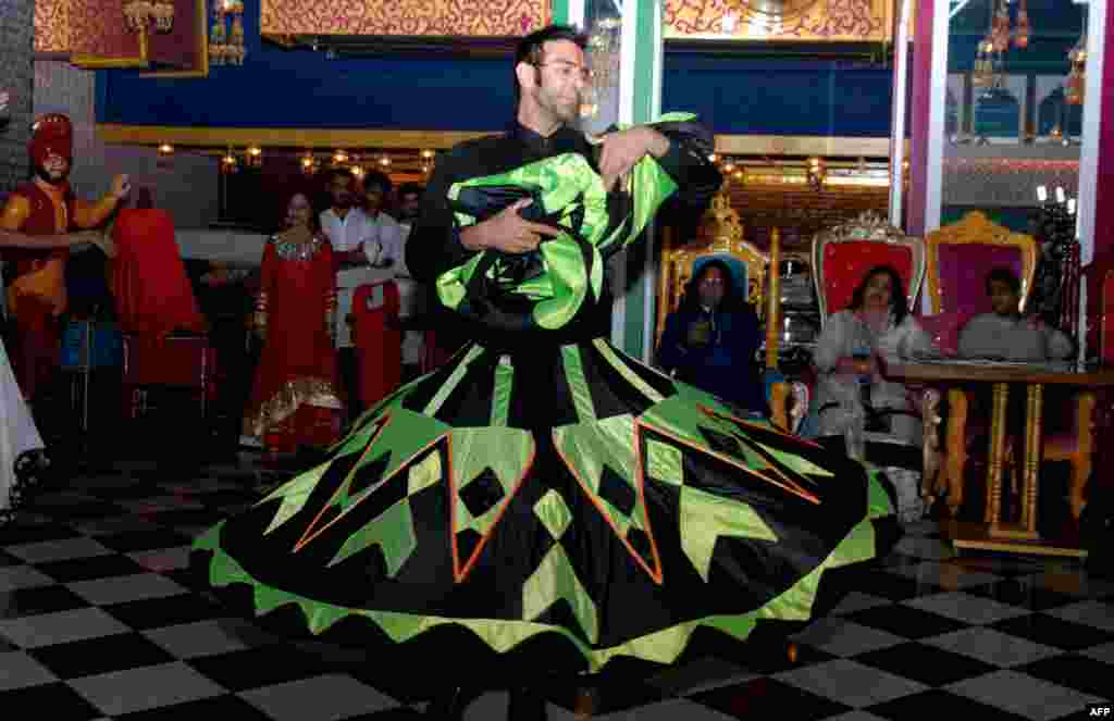 Indian Bollywood choreographer Sandip Soparkar dances during the launch of the cover page of the &#39;BE Publication Magazine&#39; in Mumbai.