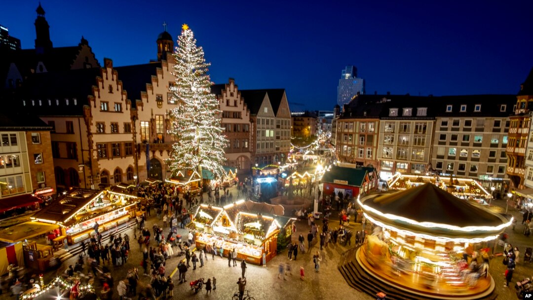 Lights illuminate the Christmas market in Frankfurt, Germany, Nov. 22, 2021.