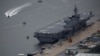 Japan Maritime Self-Defense Force's (JMSDF) latest Izumo-class helicopter carrier DDH-184 Kaga is moored at a naval base in Sasebo, on the southwest island of Kyushu, Japan April 6, 2018.