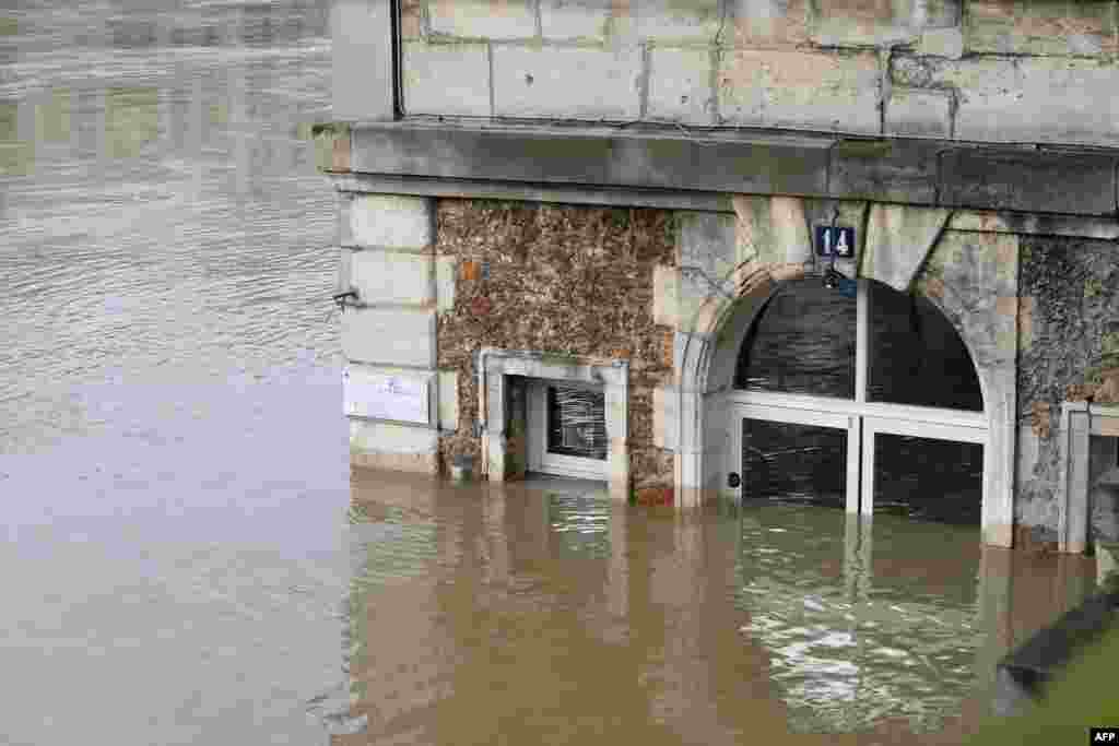 The cafe 'Les Nautes' in Paris, France, partly immersed in the the water of the Seine river. The swollen Seine rose even higher, keeping Paris on alert, though forecasters said the flooding should peak by the end of the day.