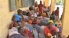 Nigeria refugees rest after being deported by Niger troops arrive in Gaidam, Nigeria, May 6, 2015. 