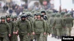 "Непрохані гості". Кримська криза на знімках світових ЗМІ. ФОТО