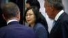 Taiwan President Tsai Ing-we, center, leaves after participating in the U.S. Taiwan Business Summit, Friday July 12, 2019, in New York.