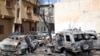 Vehicles damaged by overnight shelling are seen in Abu Salim district, Tripoli, Libya, April 17, 2019. 