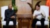 In this photo provided by the Malacanang Presidential Photographers Division, Philippine President Rodrigo Duterte, right, meets with Indian President Ram Nath Kovind during his state visit to Manila, Philippines, Friday, Oct. 18, 2019.