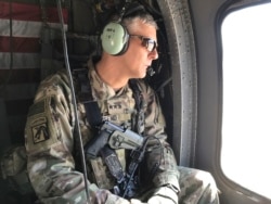 FILE - U.S. Army Lt. Gen. Stephen Townsend watches during a tour north of Baghdad, Iraq, Feb. 8, 2017.