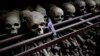 FILE - In this Sept. 27, 2009 photo, skulls and bones from some of the estimated 10,000 Tutsis killed in a two-day massacre at Nyamata church during the 1994 genocide, are displayed in a crypt behind the church, now a memorial to the genocide, in the town