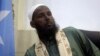 FILE - Former al-Shabab leader Mukhtar Robow attends a news conference in Mogadishu, Somalia, Aug. 15, 2017. 