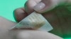High performance multifunctional wearable electronics integrated with nanoparticles are attached to the skin for the diagnosis and therapy of motion-related neurological disorders. (Credit: Donghee Son and Jongha Lee)