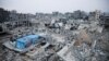 Houses destroyed in previous Israeli strikes lie in ruin, in Khan Younis in the southern Gaza Strip