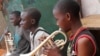 The children living at M-lisada practice their instruments every day, Kampala, Uganda, Oct. 11, 2013. (VOA/Hilary Heuler)