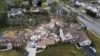 .A home on the 1800 block of Princeton Circle is leveled after an overnight tornado swept through the area in Naperville, Ill., Monday, June 21, 2021.(Paul Valade/Daily Herald via AP)