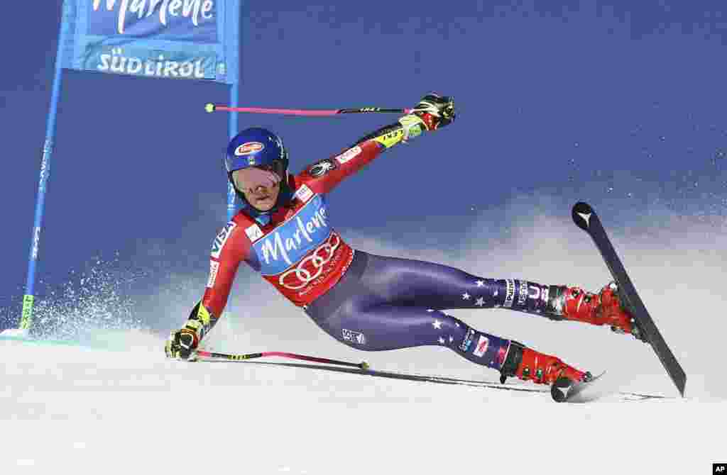 United States' Mikaela Shiffrin looses her balance as she speeds down the course during an alpine ski, women's World Cup giant slalom at the Kronplatz resort, in San Vigilio di Marebbe, Italy.