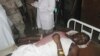 A student wounded during a suicide bomb attack at the College of Administrative and Business Studies receives treatment at a hospital in Potiskum, Nigeria, May 8, 2015.