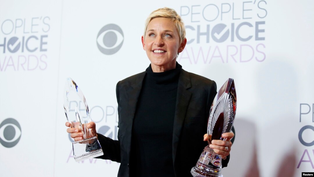 Ellen DeGeneres poses backstage with her Humanitarian Award and Award for Favorite Daytime TV Host during the People's Choice Awards 2016 in Los Angeles, California, Jan. 6, 2016. 