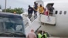 Haitianos en la frontera sur: Unos deportados, otros inician sus trámites migratorios
