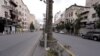 The streets of the Jordanian Capital are seen empty after the start of a nationwide curfew, amid concerns over the coronavirus pandemic, in Amman, Jordan, March 21, 2020. 