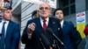Former Mayor of New York Rudy Giuliani speaks during a news conference outside the federal courthouse in Washington, Dec. 15, 2023.
