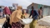 Food supplies are distributed during a visit by WFP Regional Director to a camp for the IDPs in Adadle, in the Somali Region of Ethiopia, Jan. 22, 2022. 
