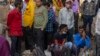 Indian daily wage laborers wait to get hired in Mumbai, Feb. 1, 2022. Indian Prime Minister Narendra Modi's government announced a series of investments to shore up spending in infrastructure projects in its annual budget, ahead of key state elections.