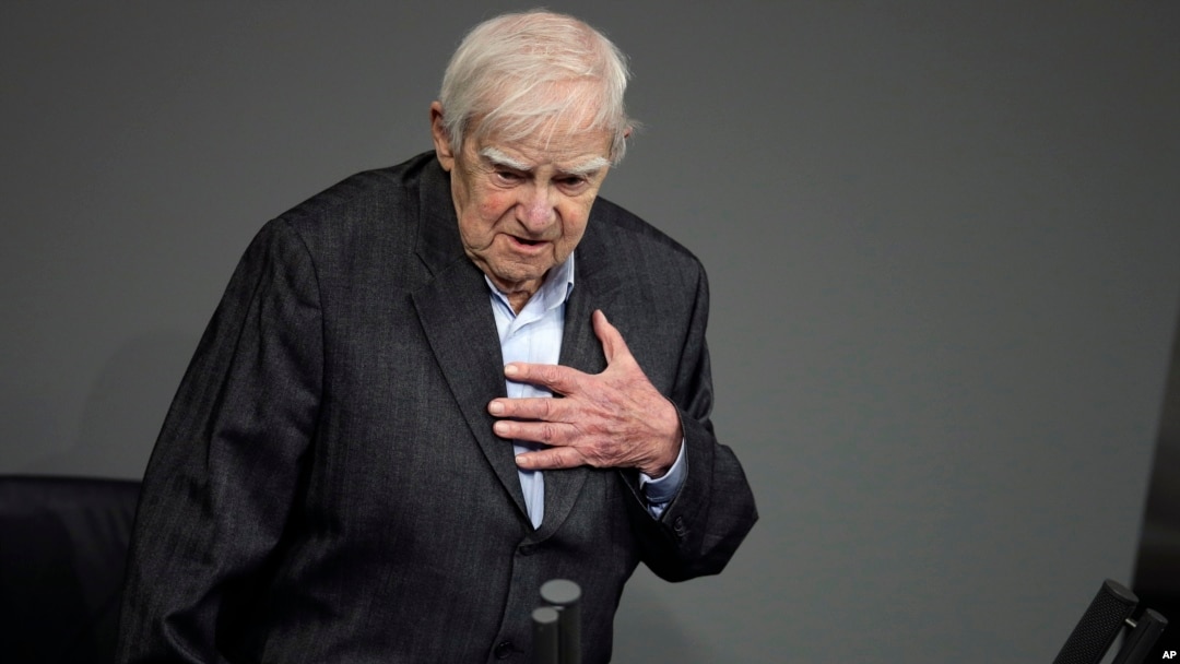 FILE - Russian author Daniil Granin speaks during a ceremony marking the Day of Remembrance for the Victims of National Socialism at the German Parliament, Bundestag, in Berlin, Germany, Jan. 27, 2014. 