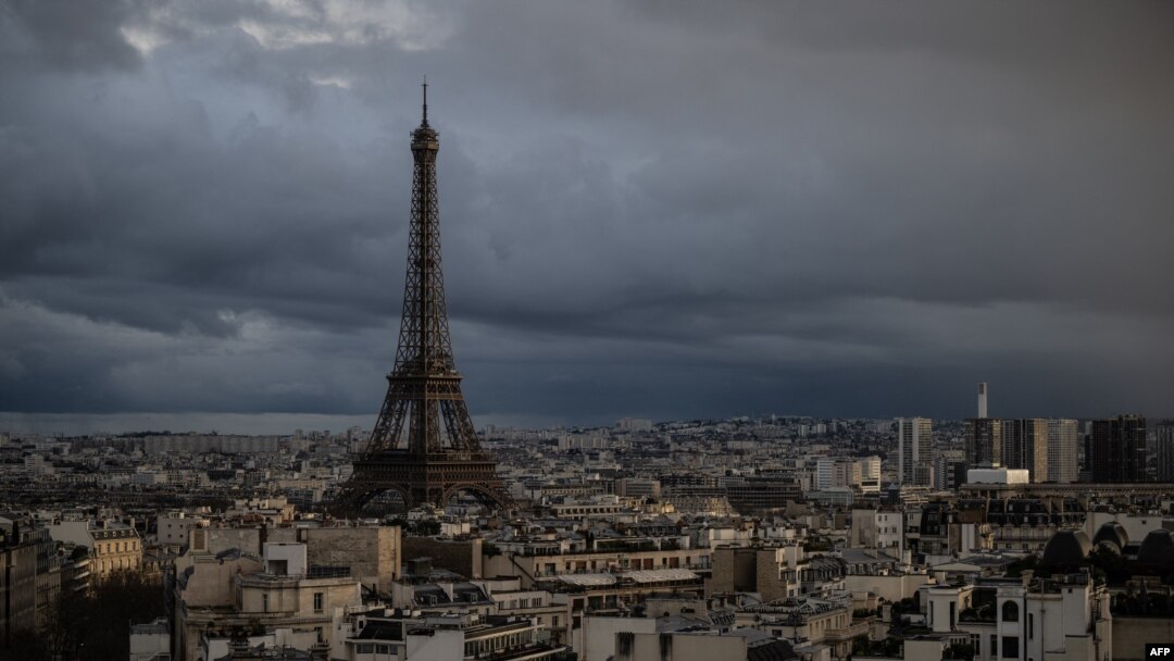 This photograph taken on Feb. 23, 2024, shows the Eiffel Tower on a cloudy day in Paris. The monument will reopen to tourists on Feb. 25 after staff ended their strike.