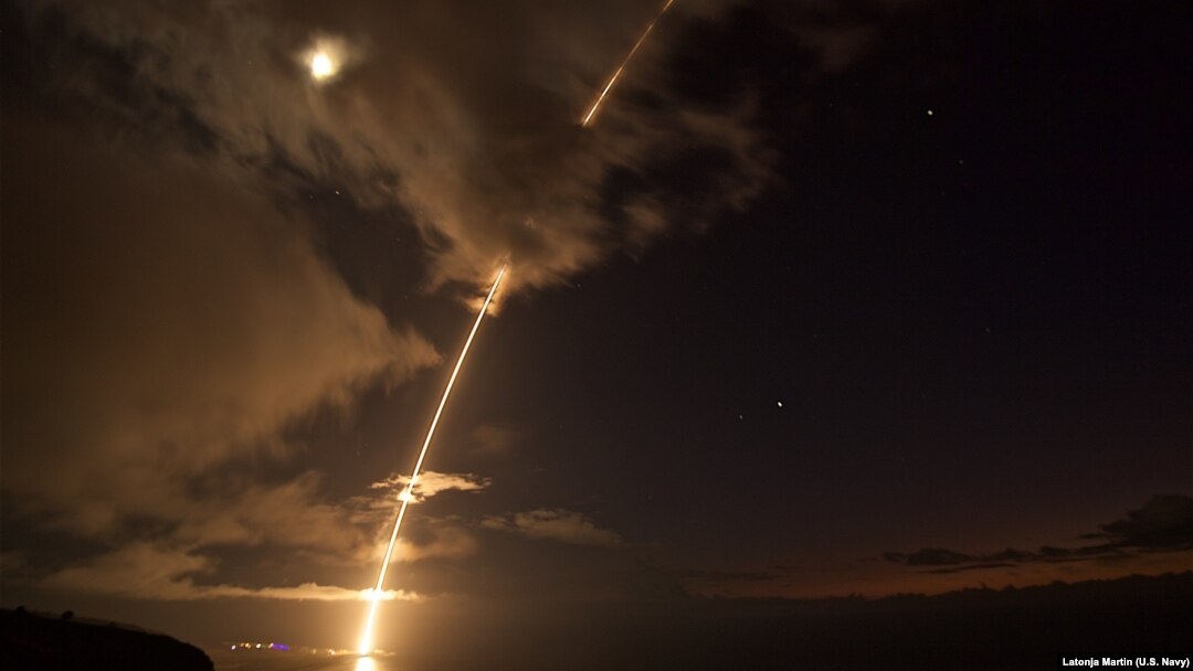 FILE - A medium-range ballistic missile target is launched from the Pacific Missile Range Facility in Kauai, Hawaii August 29, 2017. The target was successfully intercepted by SM-6 missiles fired from the guided-missile destroyer. (US Navy photo by Latonja Martin)