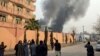 Smokes rises after a deadly suicide attack in Jalalabad, Afghanistan, Jan. 24, 2018.