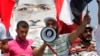Supporters of ousted President Mohamed Morsi attend weekly Friday prayers at Rabaa Adawiya square, where they are camping, in Cairo July 12, 2013. 