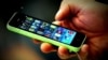 FILE - an Apple iPhone