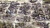Buildings damaged during Cyclone Kenneth are seen from the air in a village north of Pemba, Mozambique, May 1, 2019. 