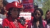 Representative Frederica Wilson of Florida, left, gathers with Nigerian girls and other U.S. lawmakers Thursday on the U.S. Capitol to mark the two-year anniversary of the abduction of more than 200 girls from Nigeria by the militant group Boko Haram. (C. Saine/VOA)