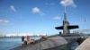 美國海軍俄亥俄級內華達號核潛艇（SSBN-733）1月15日現身關島海軍基地。 （照片來自美國海軍推特）