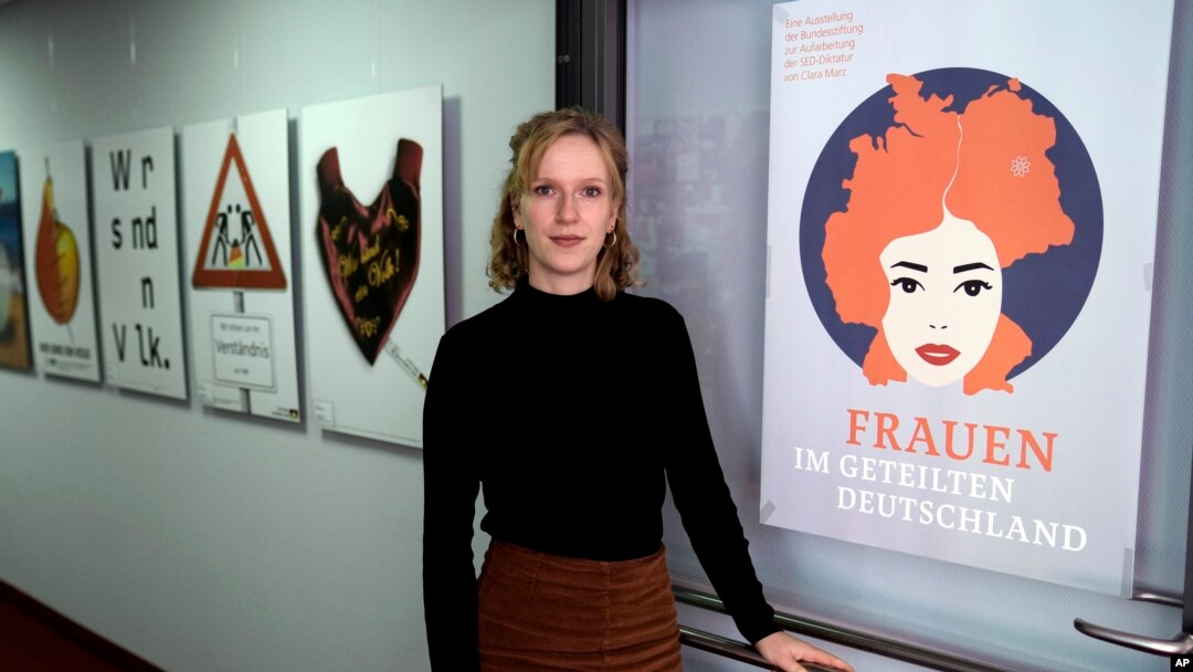 Clara Marz, an organizer of an exhibition about women, attends an interview with the Associated Press in her office in Berlin, Germany, Oct. 17, 2024.