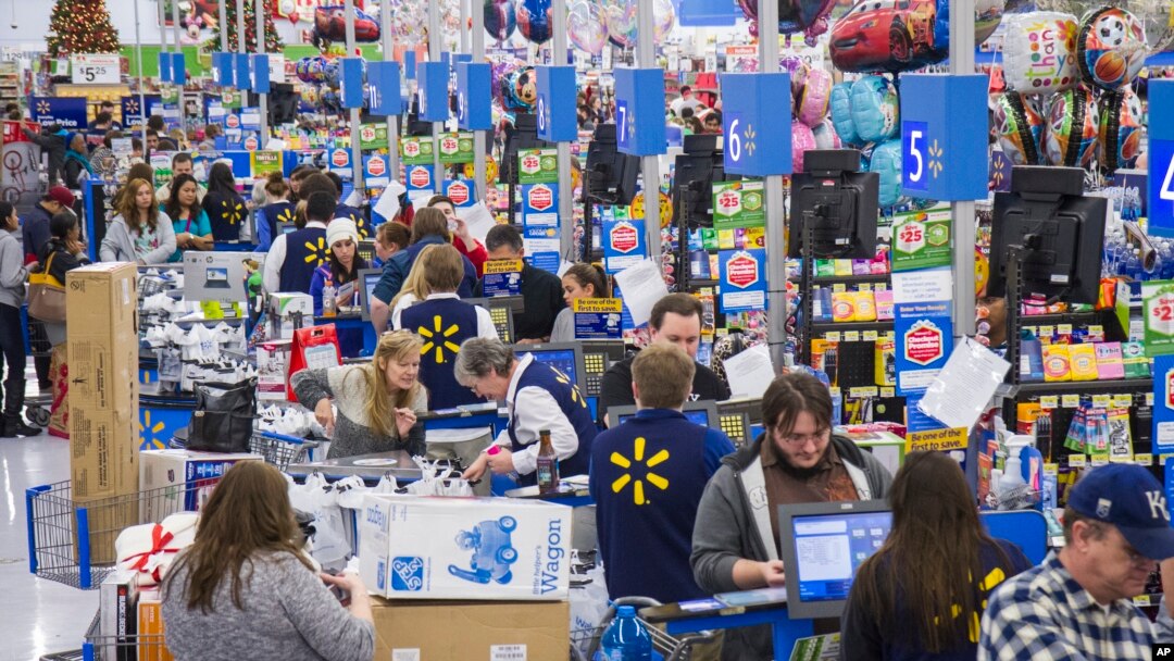 Customers wrap up their holiday shopping during Walmart's Black Friday events in Bentonville, Arkansas on November 27, 2014 (Gunnar Rathbun/AP)